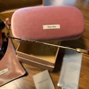 NWT Miu Miu round sunglasses. Comes with all original boxes, duster etc. Miu Miu | Accessories | Nwt Miu Miu Round Sunglasses Comes  main image 2